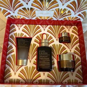 Estee Lauder Skincare Set with Red and Gold Accents